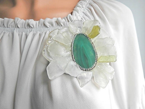 green brooch