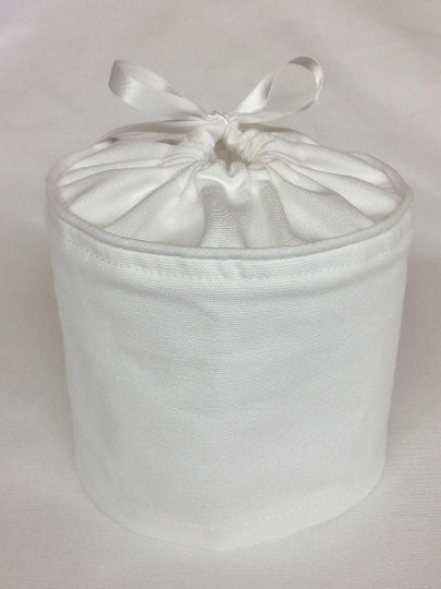 Still a customer favorite, our white toilet paper covers.