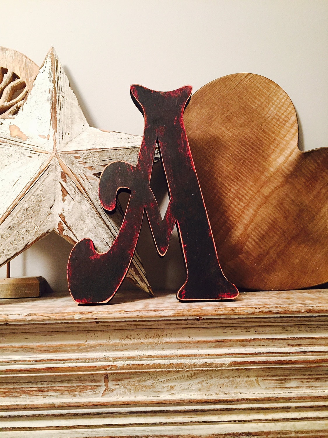 Letter A, victorian font, painted red, with black overlay, distressed