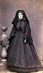 A woman in full mourning attire in the 19th century.