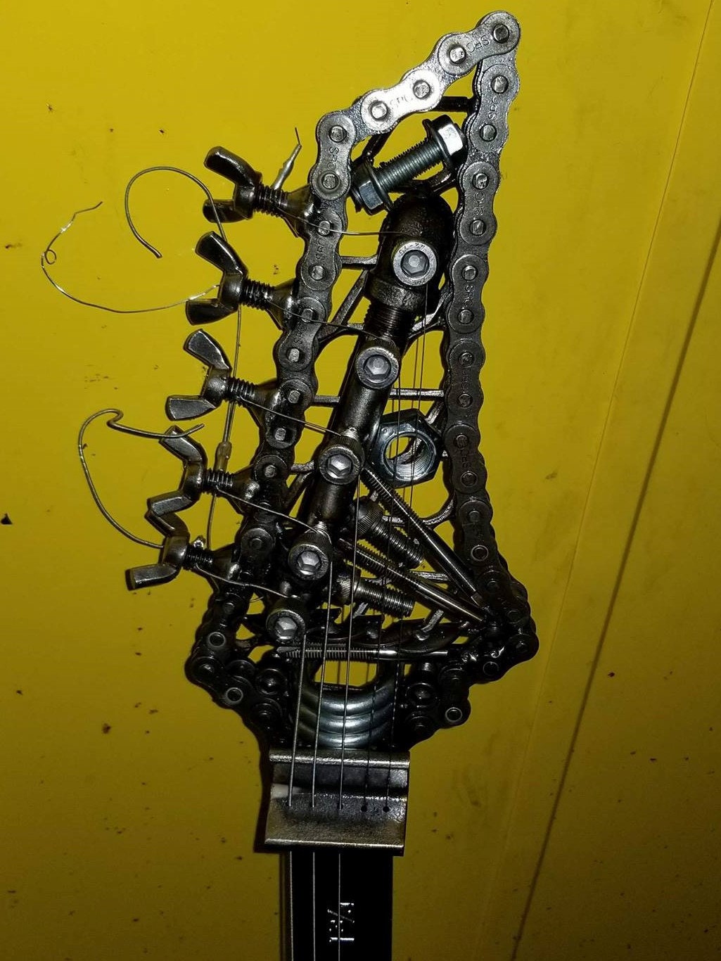 Welded Scrap Metal Guitar Head.