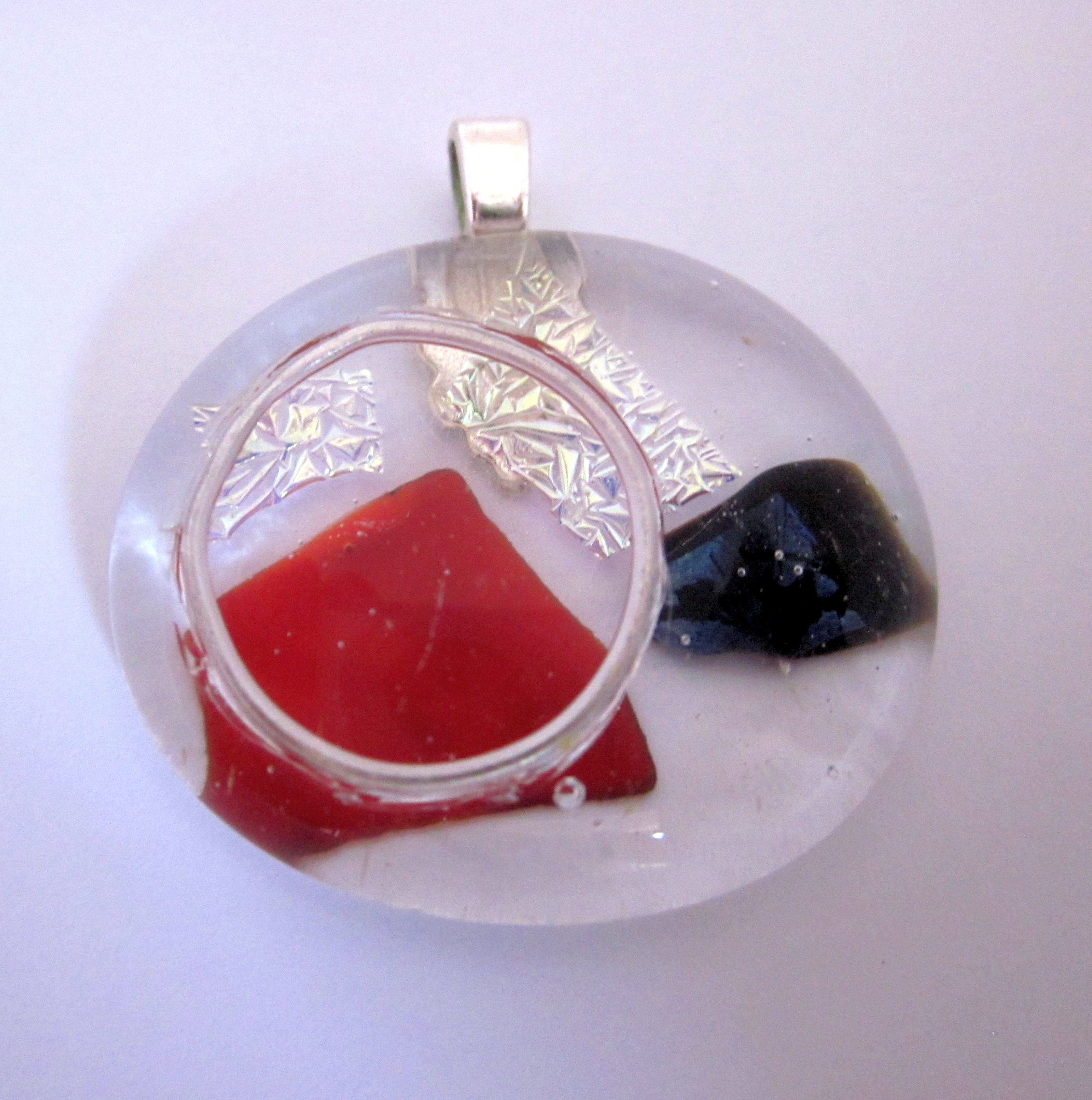 Glasanhänger mit eingeschmolzenem Silber