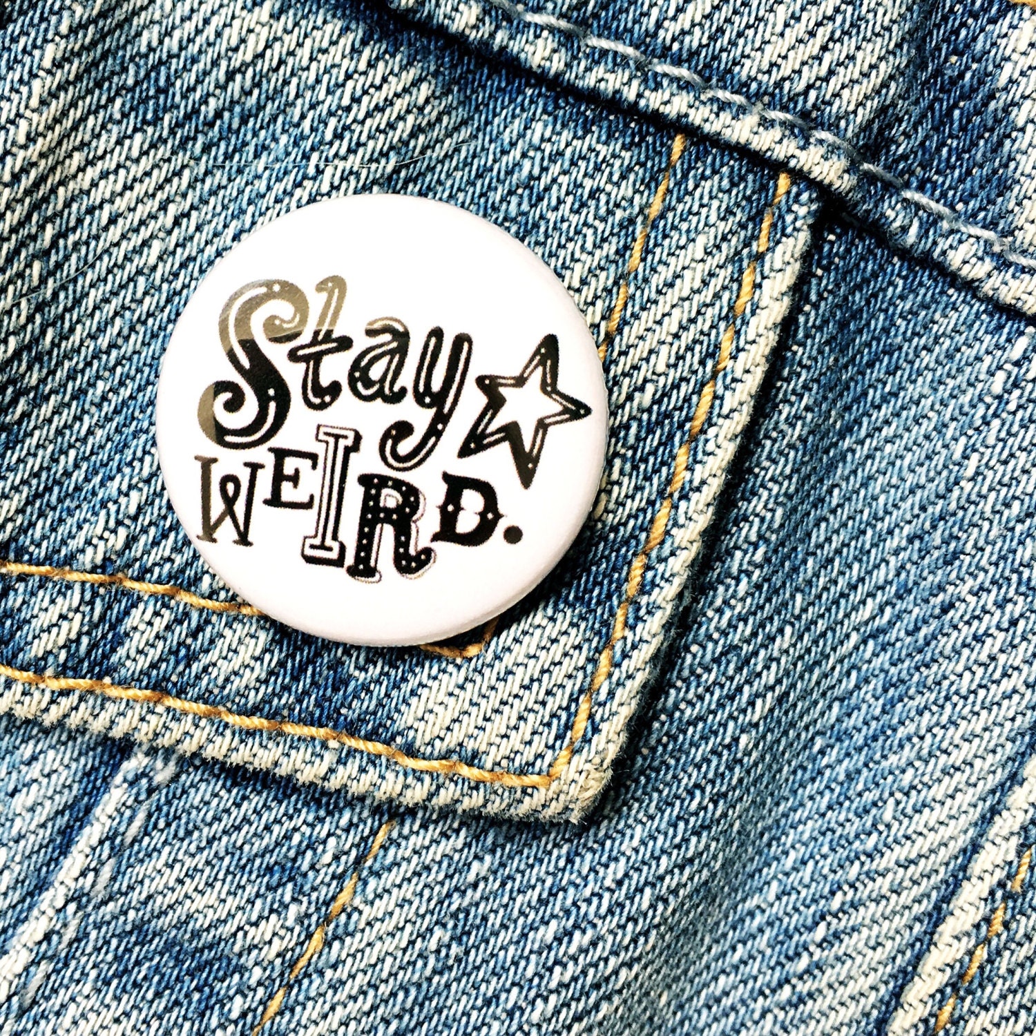 Stay weird badge