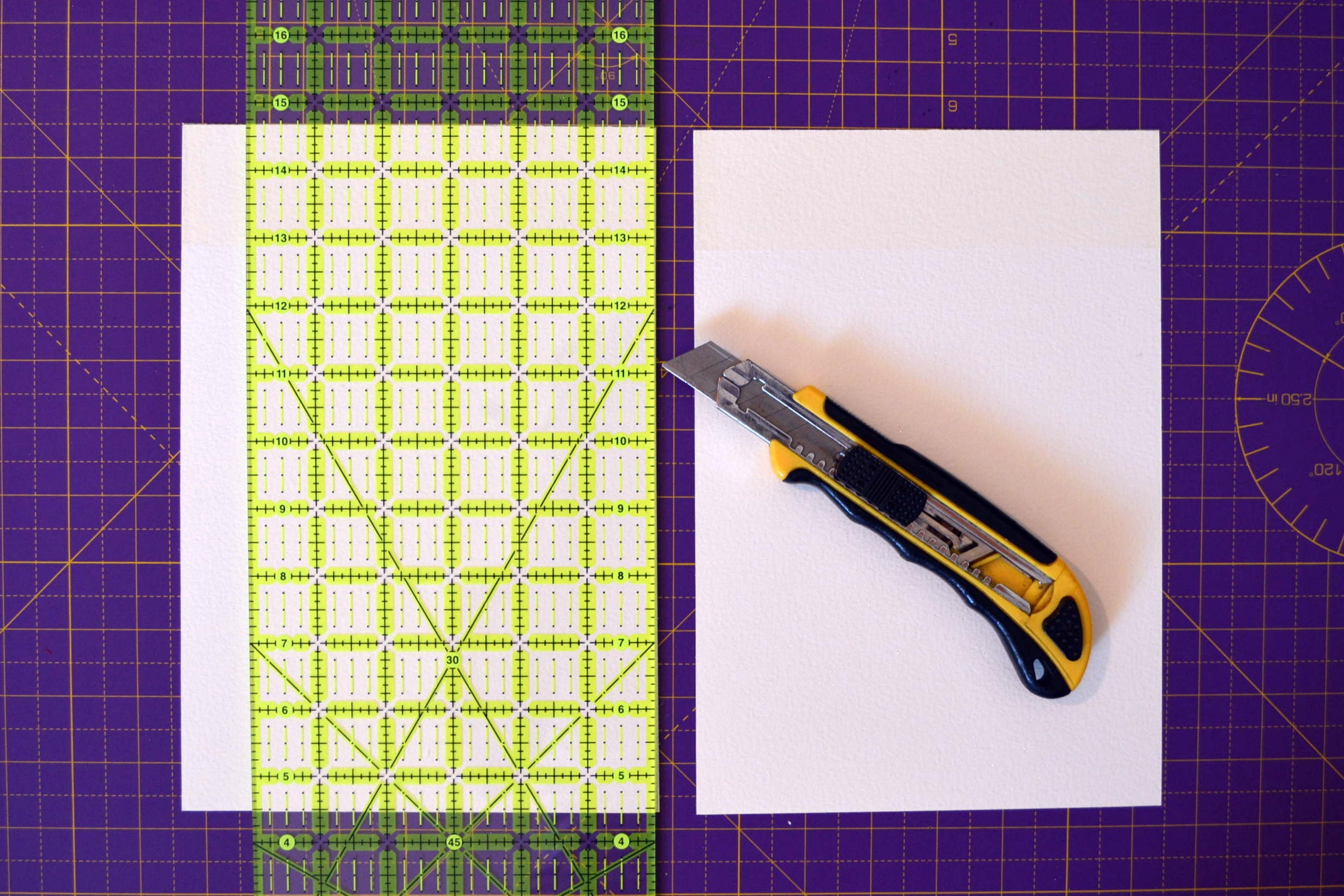 Cut paper in half