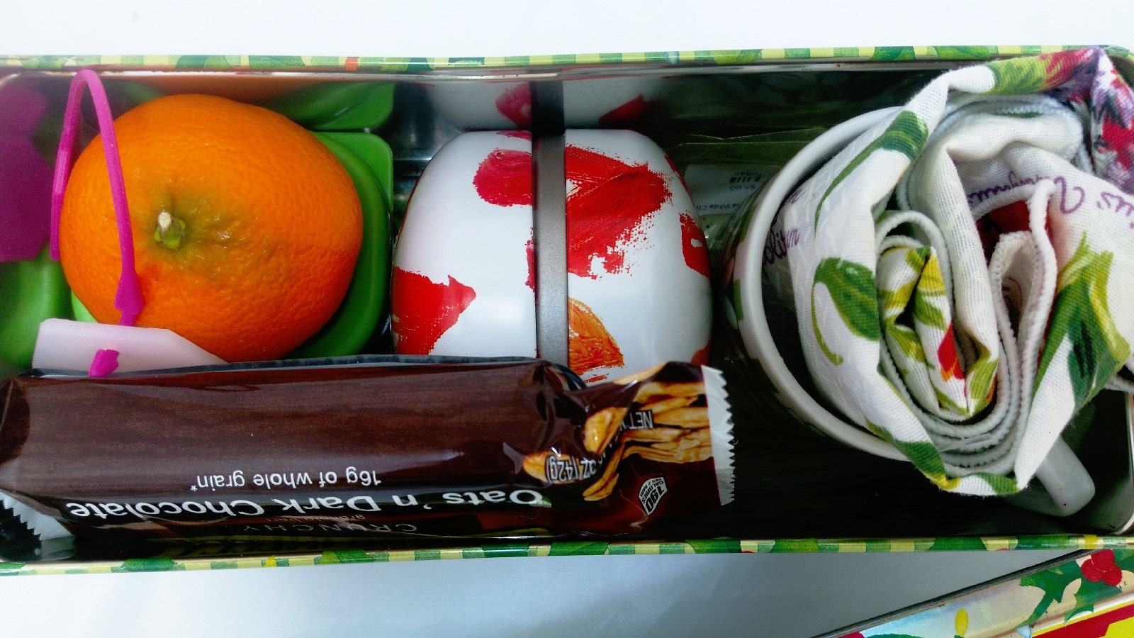 snack and tea in a vintage tin for a refreshing break