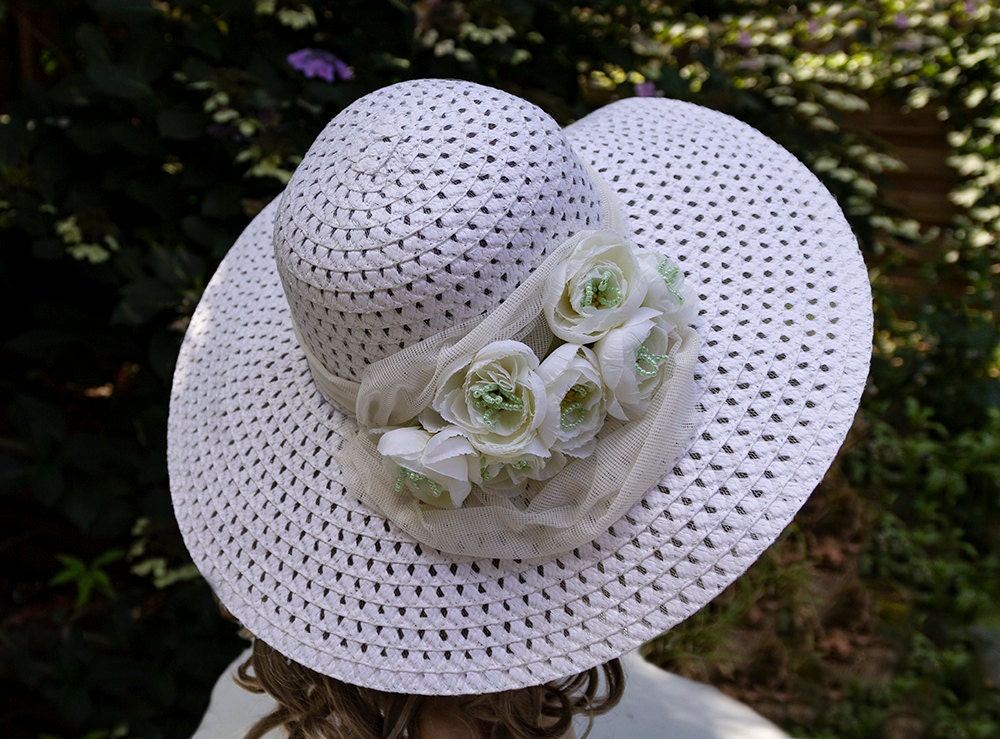 Why we are so fascinated about hats? This small accessory is often more than just a fashionable addition to your outfit. In addition to providing some welcome flair for a stylish ensemble, it can be an indicator of status or position, a necessary item for survival in cold winters or hot deserts. It cna be also used as a basket to store and carry personal items. But for me it is very important prop in the photo shoot. This hat I created from the very cheap summer hat I found in our local 1 $ store. You only need some artificial flowers, fabric, beads, wire, hot glue pistol, pliers and patience. But in a few hours, you will have your own hat and nobody else will have the same hat.
