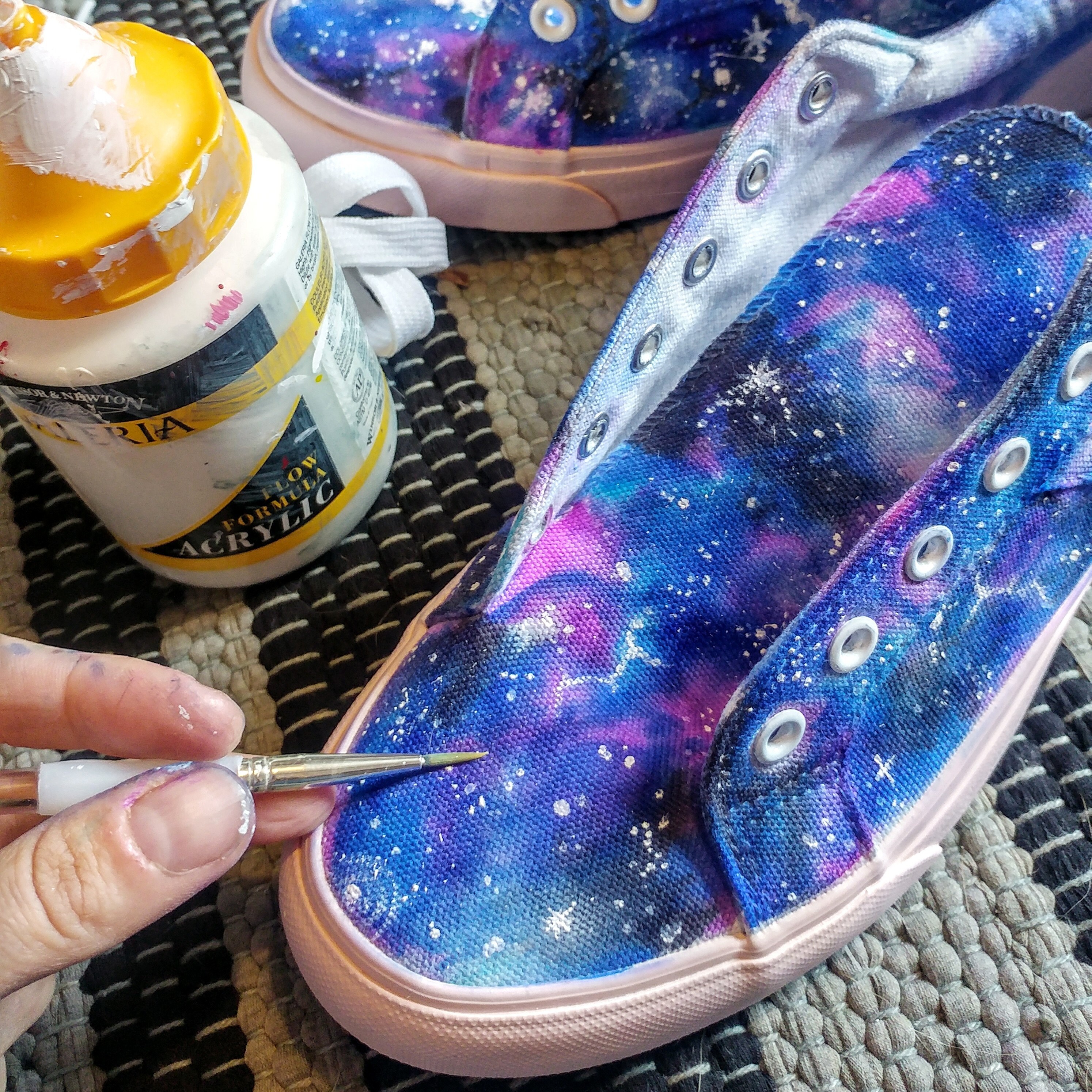 Painting stars with white acrylic