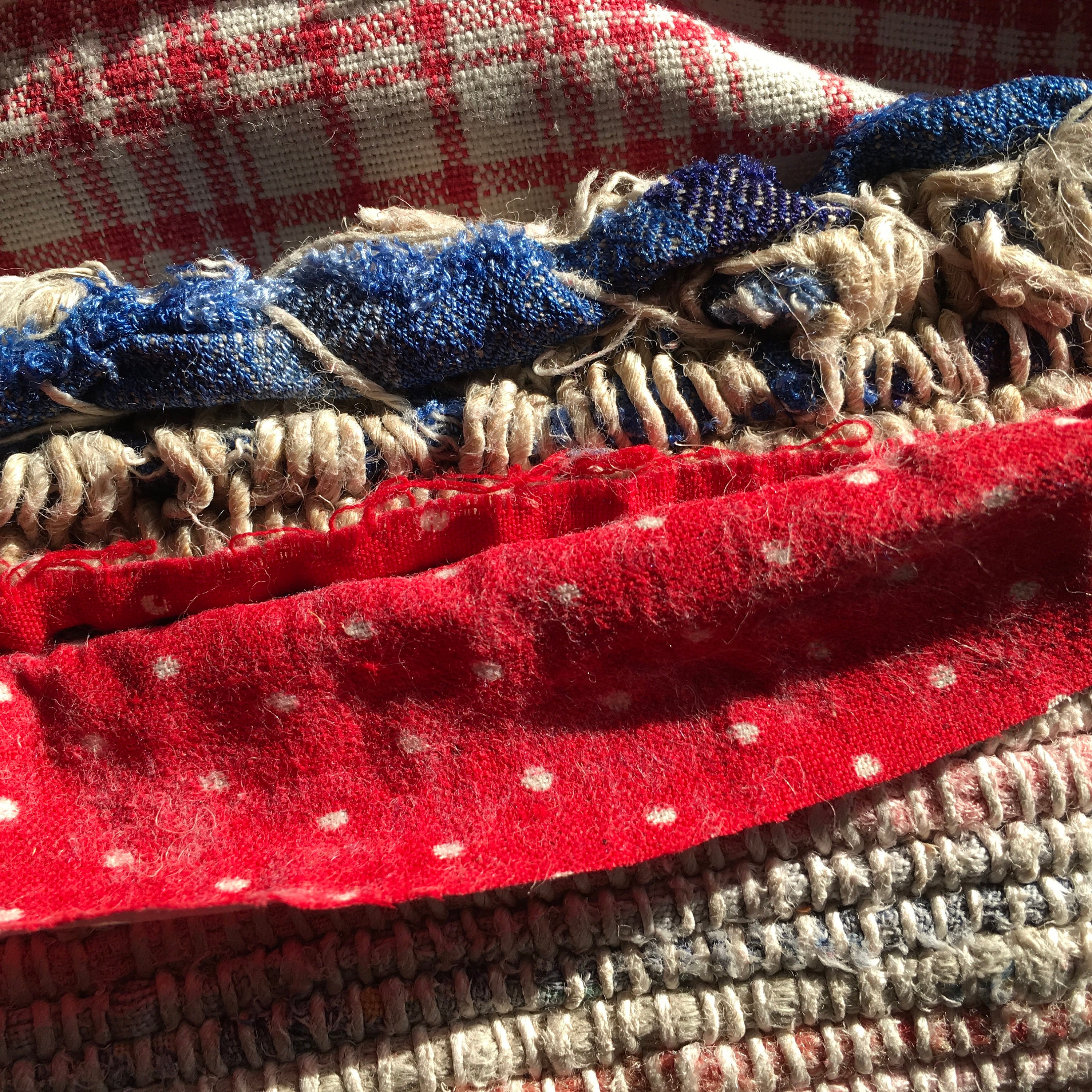 Bound edges of vintage rag rugs