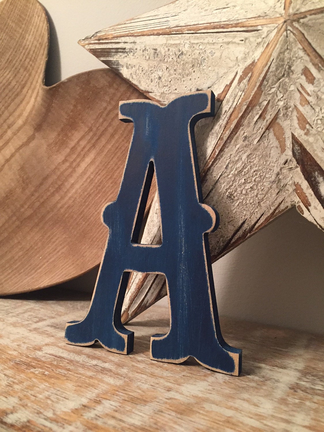 Letter A in Circus Font - shown in Navy with a distressed finish.