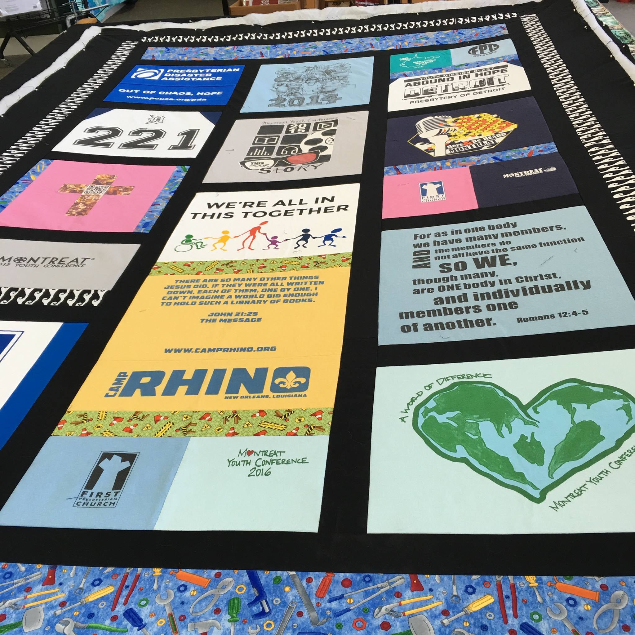 This memory Quilt was made with t-shirts from various church mission trips.