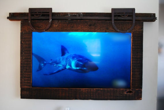 TV frame with reclaimed wood and antique barn door hardware
