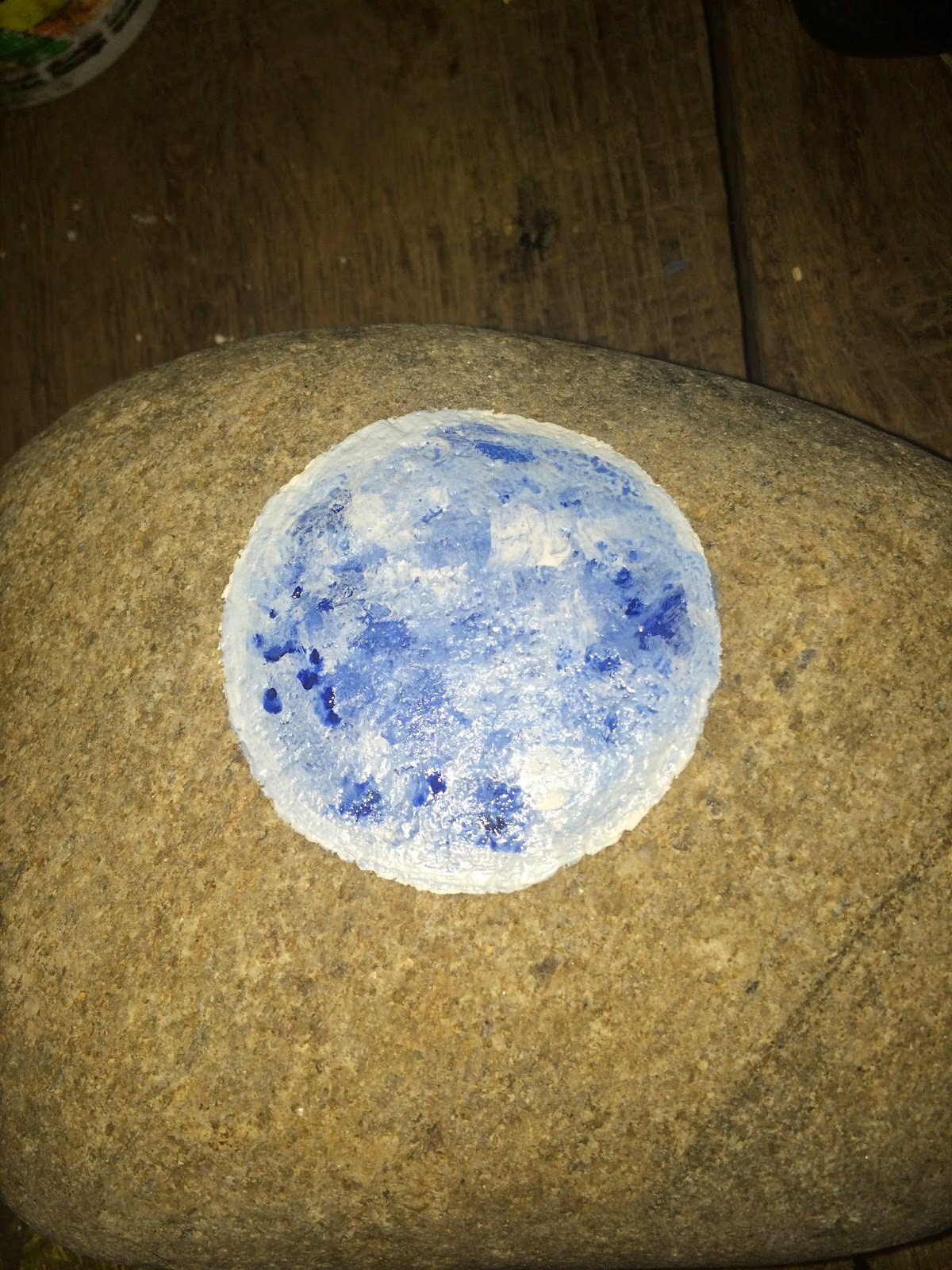 Blue blended into the white moon with dark shading