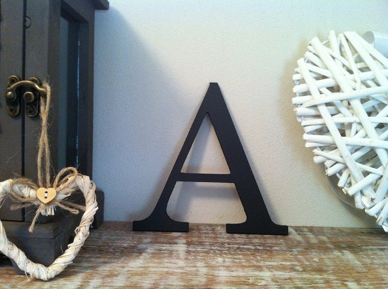 Roman Letter, shown in black plain finish.