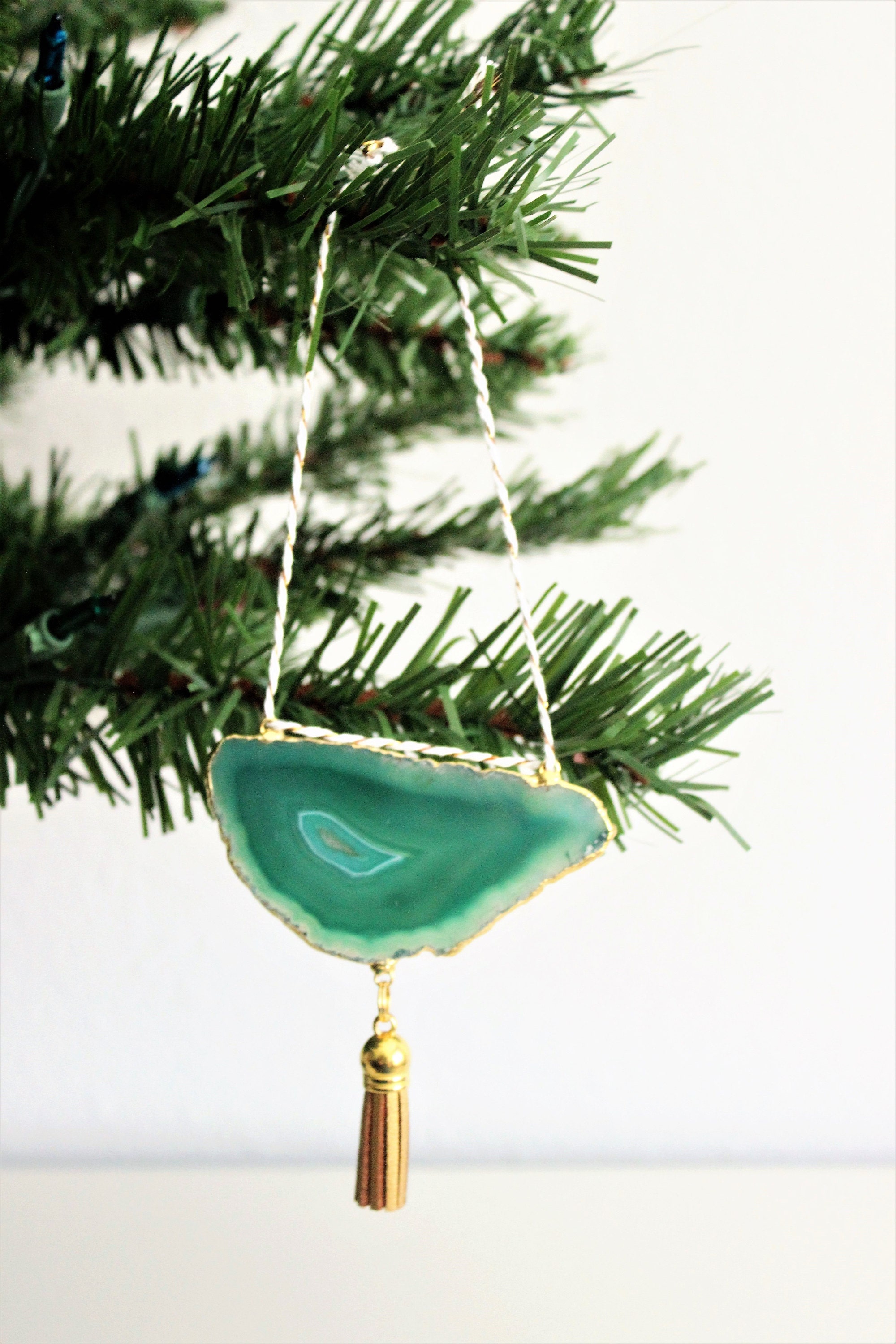 Green Boho Agate Ornament hung with Metallic Bakers Twine