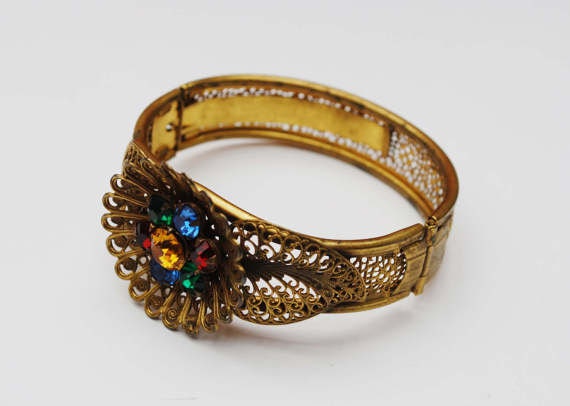 https://www.etsy.com/listing/517182575/art-deco-nouveau-gold-filigree-flower?ga_search_query=flower&ref=shop_items_search_77