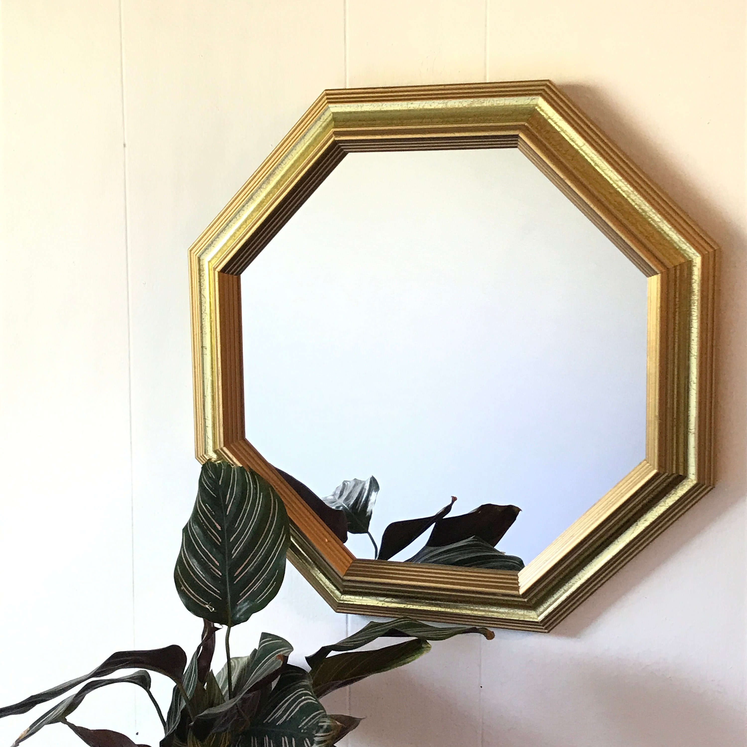 I always use mirrors in my decorating - they add depth and light in a space.