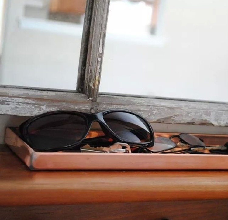 Copper tray by the front door