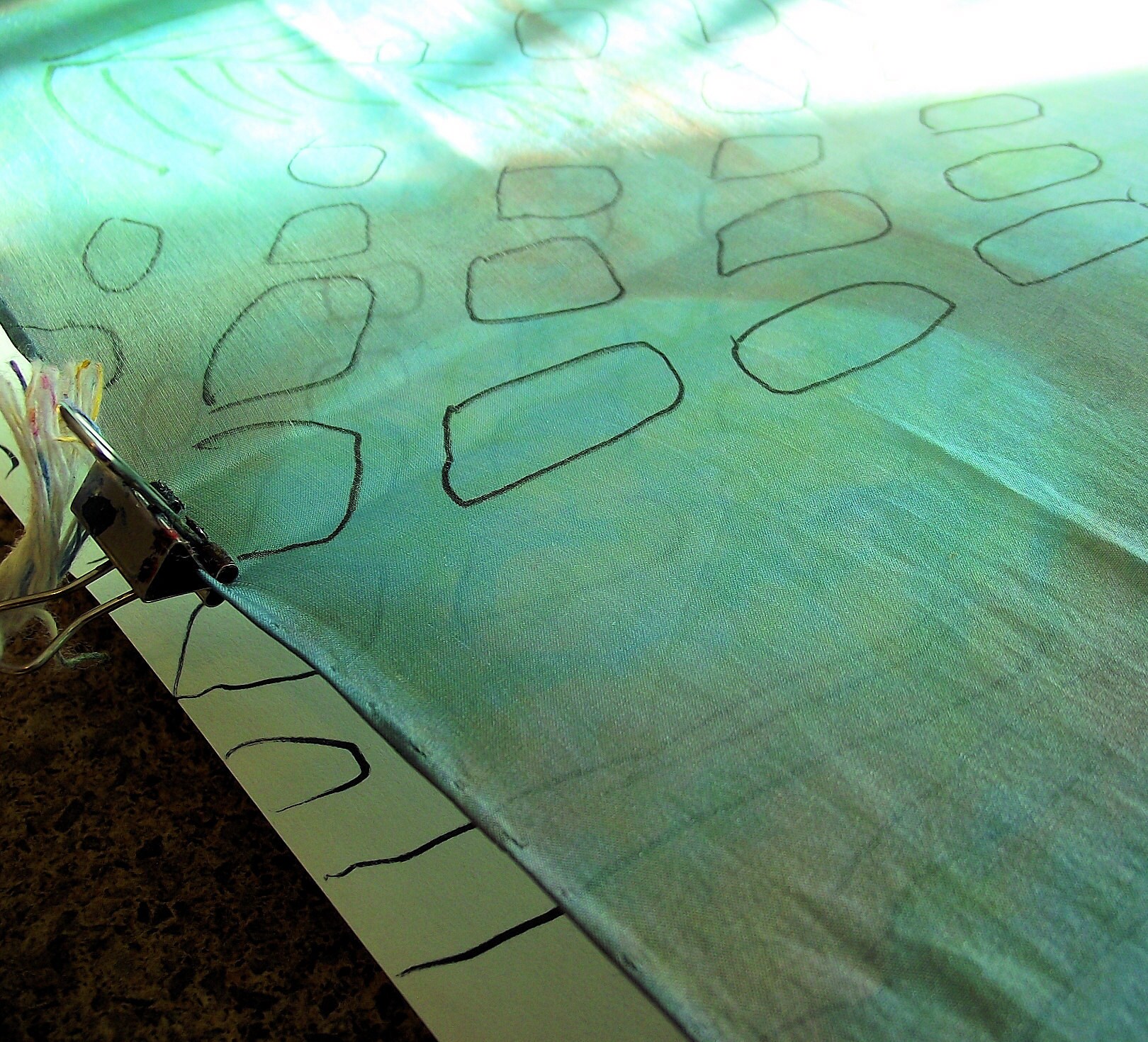 Repeating the design on the silk with the paper pattern underneath