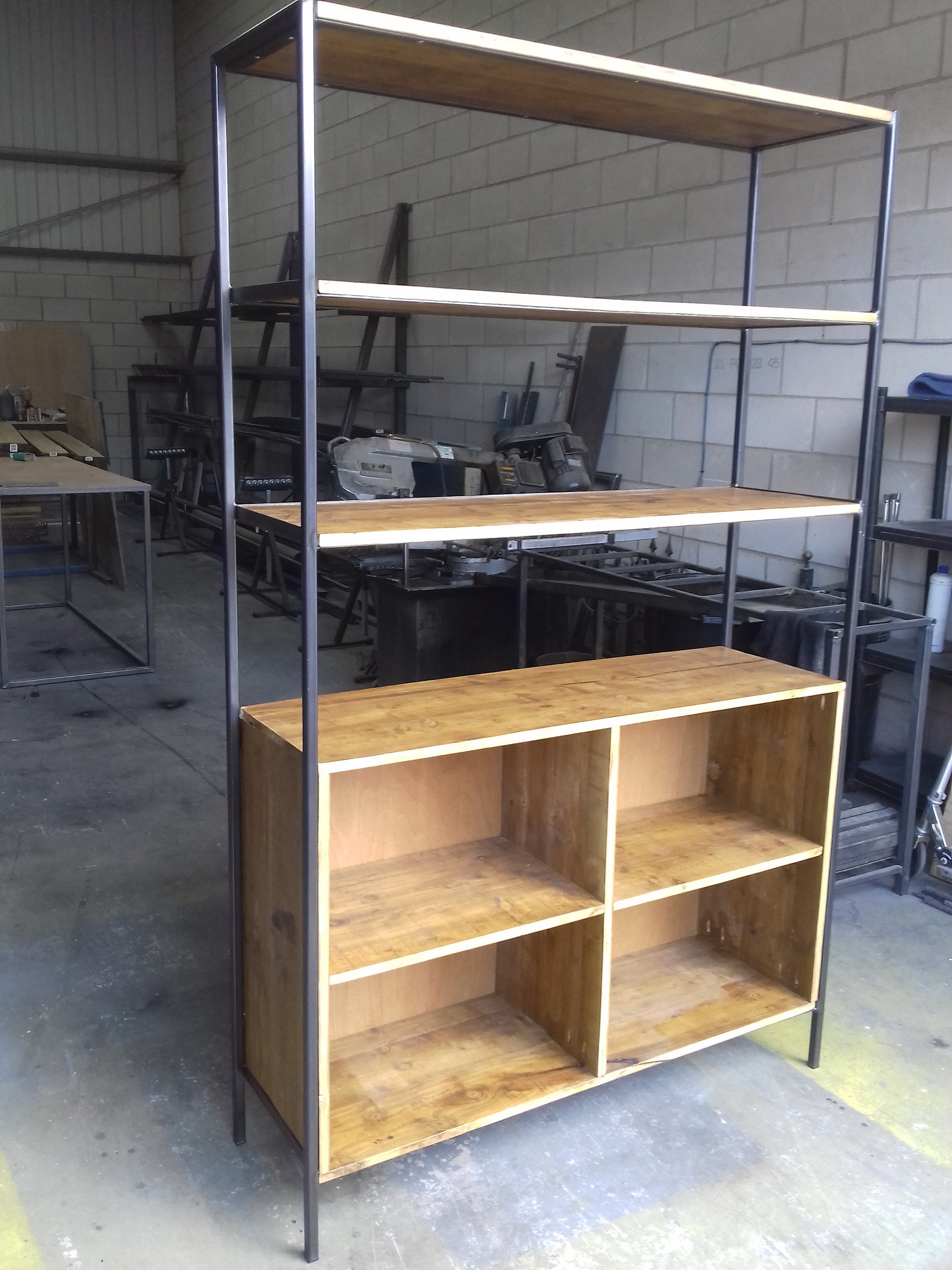 Custom made shelving incorporating enclosed shelving.