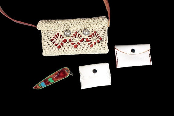 Handbag, Shoulder Bag, Purse, Leather Card Case, Leather Change Purse, Hand Tooled Key Chain, Winter White and Red, Handmade, Crochet Handbag, Shoulder Bag, Purse, Leather Card Case, Leather Change Purse, Hand Tooled Key Chain, Winter White and Red, Handmade, Crochet Handbag, Shoulder Bag, Purse, Leather Card Case, Leather Change Purse, Hand Tooled Key Chain, Winter White and Red, Handmade, Crochet Handbag, Shoulder Bag, Purse, Leather Card Case, Leather Change Purse, Hand Tooled Key Chain, Winter White and Red, Handmade, Crochet Handbag, Shoulder Bag, Purse, Leather Card Case, Leather Change Purse, Hand Tooled Key Chain, Winter White and Red, Handmade, Crochet 🔎zoom  Request a custom order and have something made just for you. Item details 5 out of 5 stars.      (61) reviews Shipping & Policies Handbag, Shoulder Bag, Purse, Leather Card Case, Leather Change Purse, Hand Tooled Key Chain, Red Leather Strap, Leather Interior, Winter White and Red, Pearl and Rhinestone Buttons, Handmade, Crochet  A gorgeous and very versatile handmade crocheted shoulder bag. It has a 2 button closure, leather interior, red leather handle, and a hand tooled leather keychain. It also comes with a white leather card case with red stitching and a white leather mini change purse. The leather key chains design is a multicolored hearts. The bag is winter white with a spider stitch front in which red leather is seen underneath. The buttons are faux pearl and rhinestone to add a touch of elegance and bling.   Size: 8 1/2 inches in length 4 1/4 inches in height 1 1/2 inches in width  The bag is crocheted using Number 5 winter white crochet cotton.   All leather is provided by Lawrence Carter from AcrossLeather here on Etsy. Lawrence is an expert leather artist. His shop carries a unique line of dog and cat collars, wallets, belts and more.  www.etsy.com/shop/AcrossLeather  The crocheting is done by myself, Patti Turon, here at ADKArtsBoutique. Here is a link to more of our purses and bags.   https://www.etsy.com/shop/ADKArtsBoutique?section_id=14177951&ref=shopsection_leftnav_4   ADKArtsBoutique and Across Leather offers you the best handmade bags, purses, clutches, and totes. Every part of these bags is completely made by hand, by us. with love and attention to detail.  © AcrossLeather Pet Collars, Leashes, and Beyond  © ADKArtsBoutique © For People Who Have A Deep Love Of Things Adirondack. Meet the owners of ADKArtsBoutique Learn more about their shop and process  Patti Turon    Joseph Turon   Seymour Montrose Weatherby Frequently asked questions about ADKArtsBoutique Custom and personalized orders Gift wrapping and packaging Handbag, Shoulder Bag, Purse, Leather Card Case, Leather Change Purse, Hand Tooled Key Chain, Winter White and Red, Handmade, Crochet