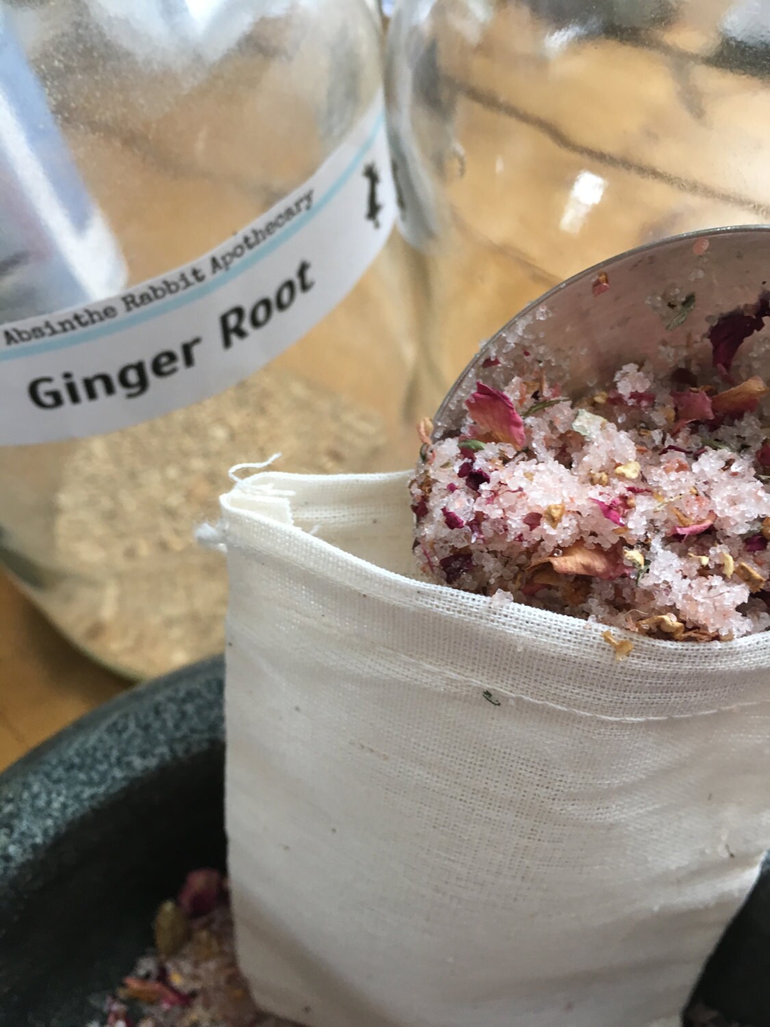 Spoon into a drawstring muslin bag to drop into your bath and create an easy clean up. I also use the bag as I light skin scrub to release even more of the rose, cardamom and ginger and soften the skin