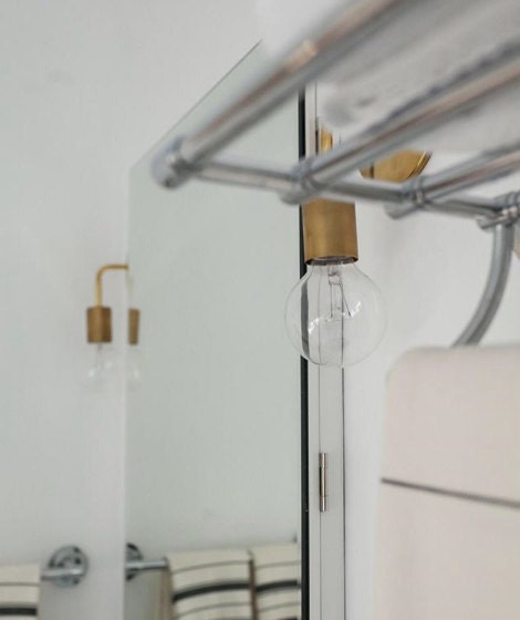 Roy sconces over bathroom vanity