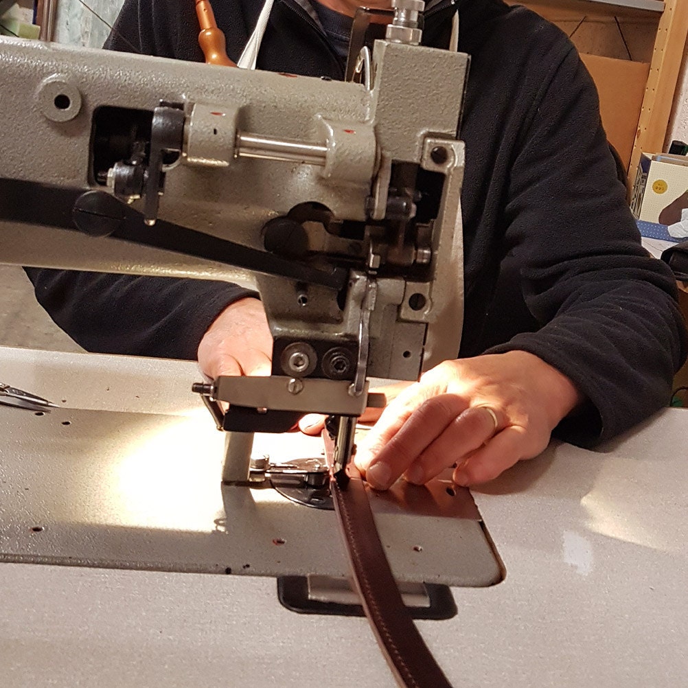 Sewing guitar straps at Pinegrove Leather