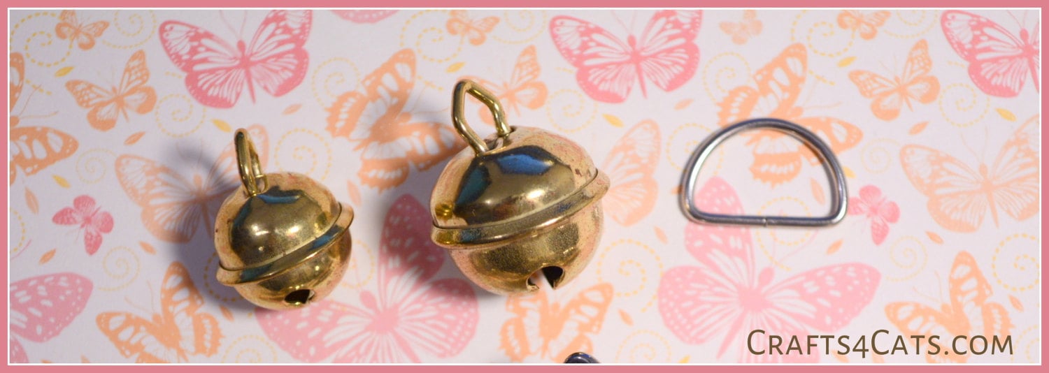 Cat collar bells and D-ring (also offered in our shop).