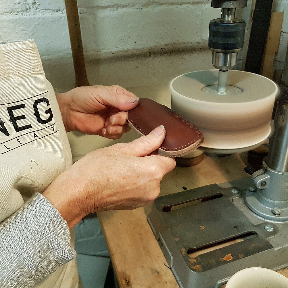 Burnishing harmonica pouches