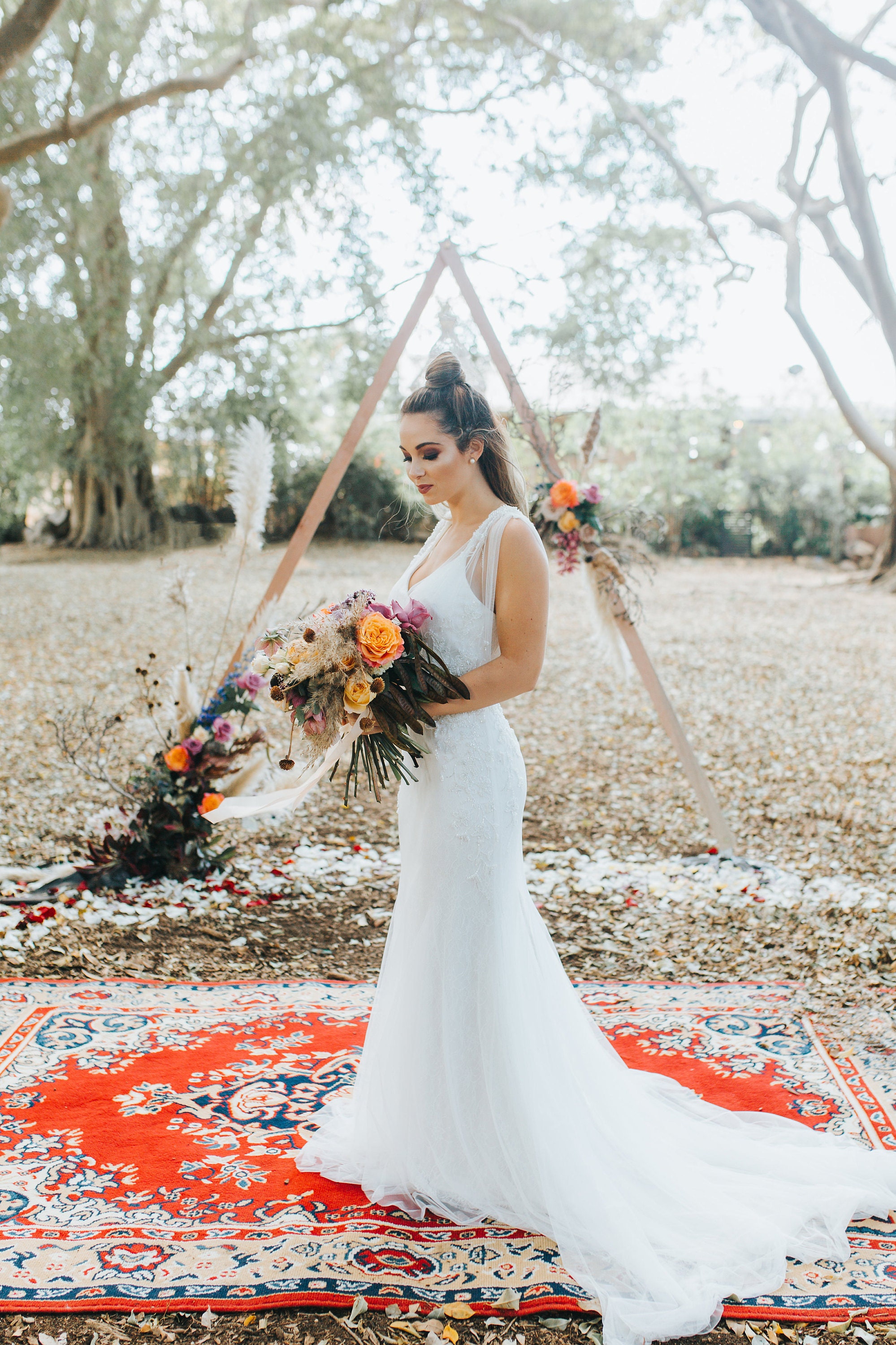 Bride at triangle wedding alter
