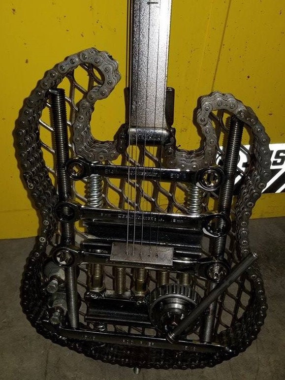 Welded Scrap Metal Electric Guitar Body.