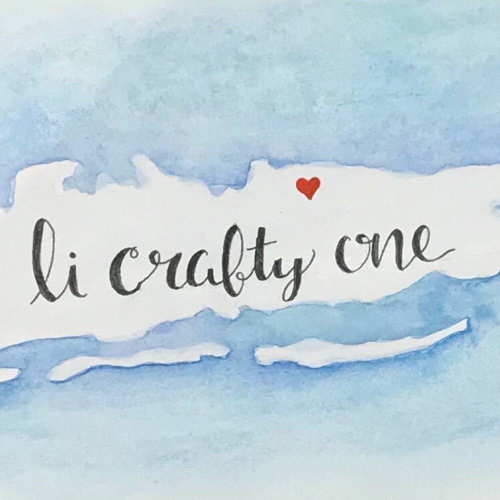 Baby shoe keepsake on fabric in pearl color painted wood frame